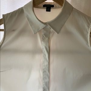 Sleeveless button down with sheer panel back